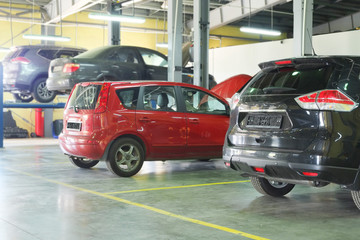 Fototapeta na wymiar Serpuhov, Russia, June, 23, 2015: Cars in a dealer repair station in Serpuhov, Russia