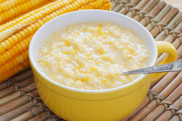 Corn porridge in yellow bowl