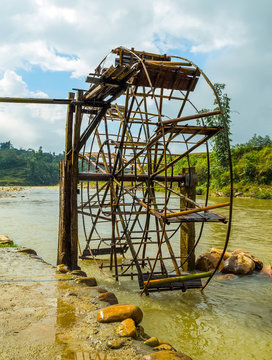 water wheel pump in river