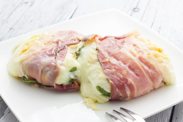 Tomino cheese with bacon