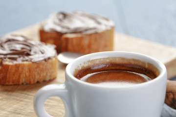 simple breakfast with cup of espresso and baguette slices