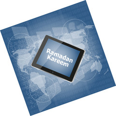 tablet pc with ramadan kareem word on it