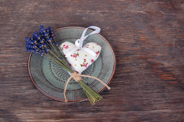 lavender flower and lavender bag on wooden table