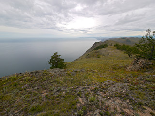 Fototapeta na wymiar The mysterious island of Olkhon on lake Baikal. The landscape of