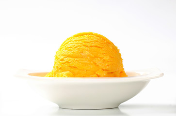 Scoop of yellow ice cream