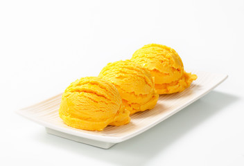 Scoop of yellow ice cream