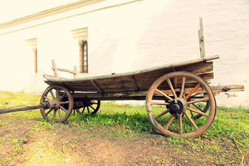 Obraz premium Vintage old wooden cart.Toned image.
