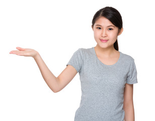 Young student with hand showing the blank sign