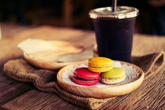 Macaroon dessert served with coffee as afternoon snacks.