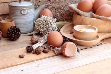 Fototapeta na wymiar soft-boiled egg and eggs on wood background