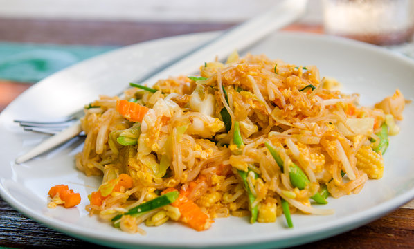 Seafood Noodles pad Thai on white disk