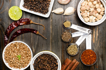 Herbs and spices on wooden background,food seasoning