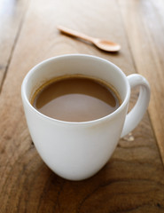 coffee cup on wooden table