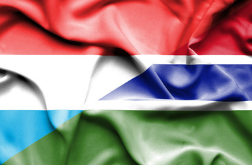 Waving flag of Gambia and Luxembourg