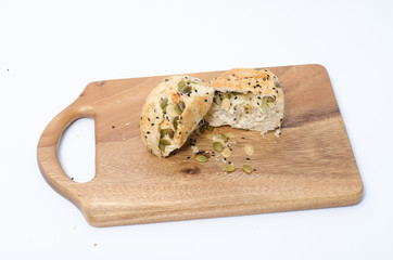  multigrain bread on wood chopping board