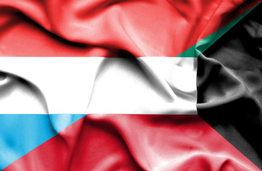Waving flag of Kuwait and Luxembourg
