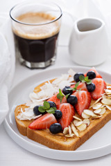 Toast with almond butter and toppings