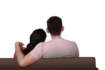 Asian couple from back on couch