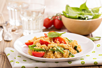 Quinoa with spinach and cherry tomatoes