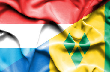 Waving flag of Saint Vincent and Grenadines and Luxembourg