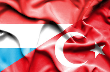 Waving flag of Turkey and Luxembourg