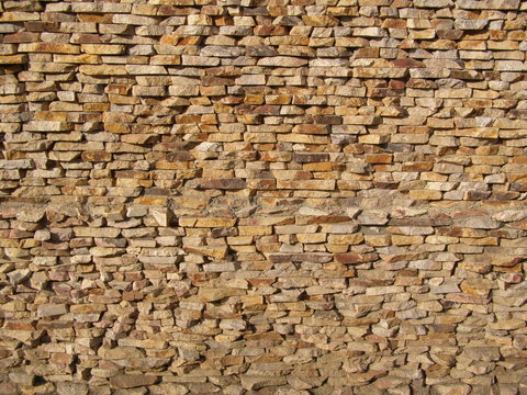 Stone wall. Texture of stone wall of the house.