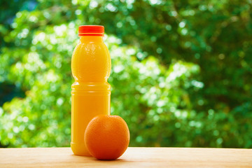 Orange and juice on the table