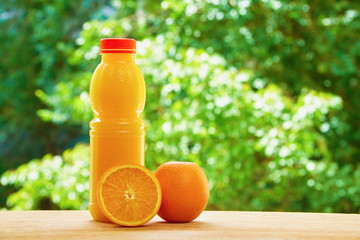 Orange and juice on the table