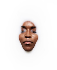 black woman's face in a milk