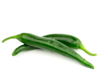 Bitter green peppers isolated on white background