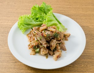 Spicy Grilled Beef Salad on A Table