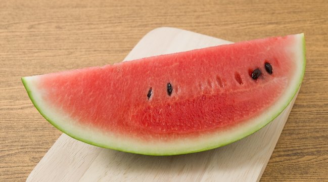 Sliced Ripe Watermelon on A Wooden Board