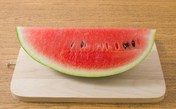 Fresh Ripe Watermelon on A Wooden Tray