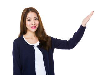 Asian woman with hand showing blank sign