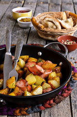 Potatoes with sausages