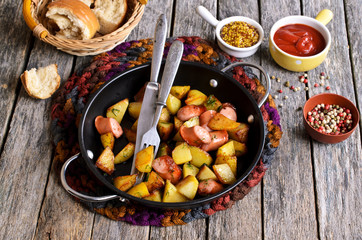 Potatoes with sausages