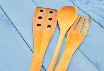kitchen tools on a blue board