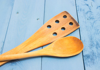 kitchen tools on a blue board