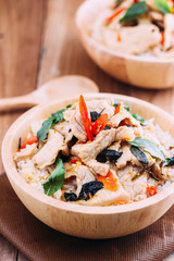 Close up Rice topped with stir fried pork and basil