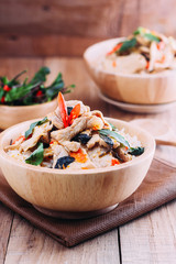 Close up Rice topped with stir fried pork and basil