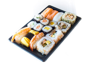 Fototapeta na wymiar Sushi packs for supermarket in white background