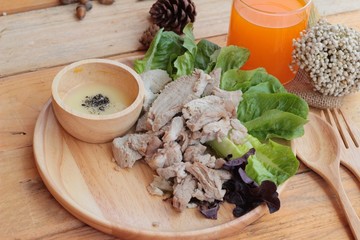 Sliced pork tenderloin with vegetables salad