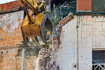 Close-up of Demolition by Backhoe