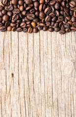 Background with coffee beans and wood texture