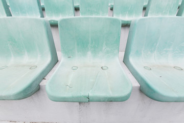 Obraz na płótnie Canvas Old green stadium seats