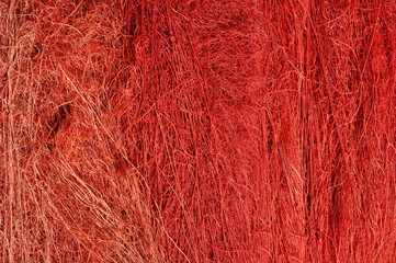 Red fishnet background. Weave texture
