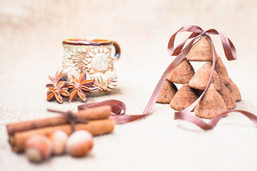Chocolate truffles candies and vintage glass of milk or cream