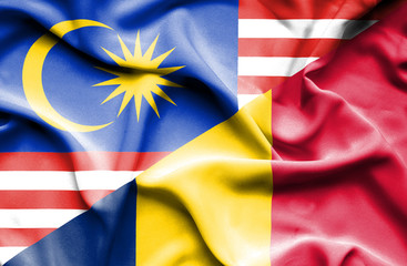Waving flag of Chad and Malaysia