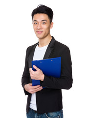 Young man holding with clipboard