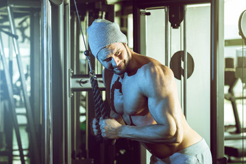 Man doing rope extension exercise